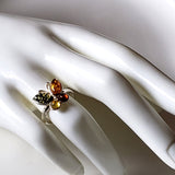 bsterling silver butterfly ring with 4 colors natural amber wings on a hand