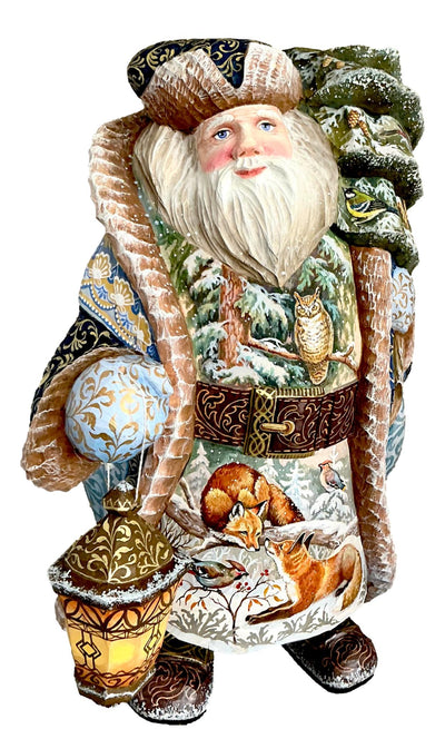 Wooden Santa in a fur coat with a lantern, hand painted snowy landscape.