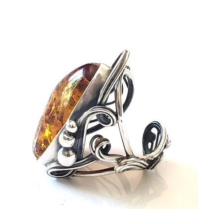 large oval amber with silver ring