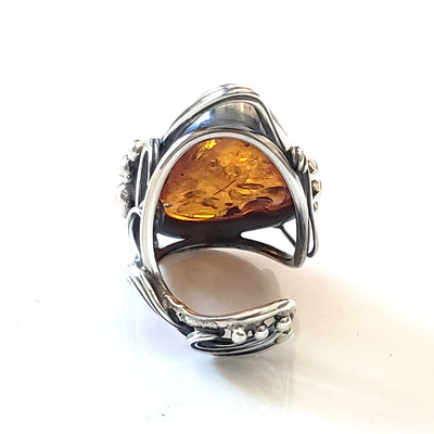 adjustable sterling silver ring with large oval amber 