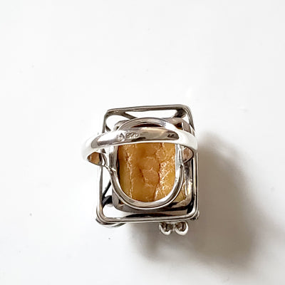 back of rectangular butterscotch amber ring in sterling silver frame