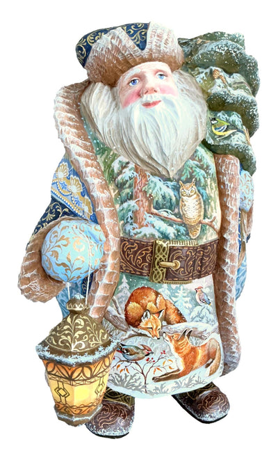 Wooden figure of a traditional Santa Claus with a lantern 