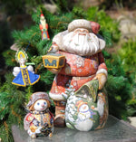 Hand carved hand painted Russian santa, snowman, ornaments