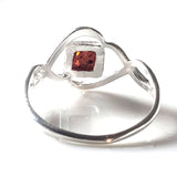 back of celtic sterling silver ring with a square amber in the center of the ring 