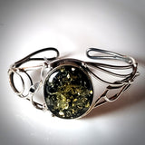 sterling silver antique cuff bracelet with oval green amber