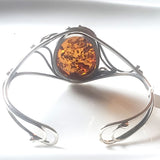 back of cuff silver bracelet with honey amber