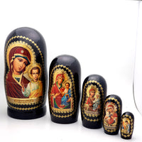 5 piece nesting doll set with different icon of Mother of God on each stacking doll 
