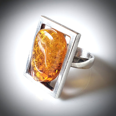 Unisex ring, large rectangle sterling silver frame with free form natural amber inside the frame  