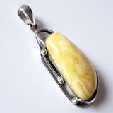 milky butterscotch oval amber pendant