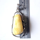 size for butterscotch oval amber pendant