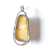 back one of the king butterscotch oval amber pendant