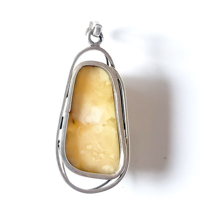 back one of the king butterscotch oval amber pendant