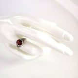 small silver ring with amber