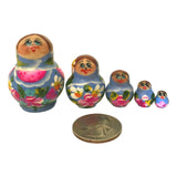 Miniature nesting dolls blue and pink