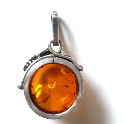 back of the Classic Round Natural amber pendant in sterling silver frame