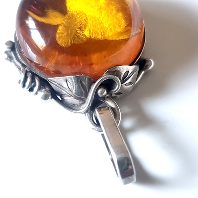 handmade sterling silver frame of Classic Round Natural amber pendant  