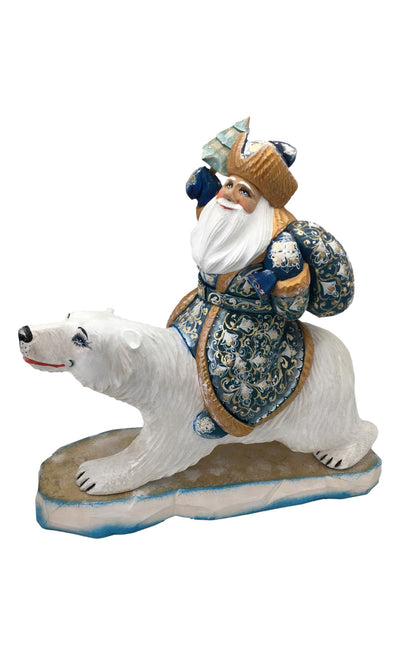 Santa riding polar bear