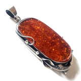 Large amber pendant in sterling silver handcrafted frame