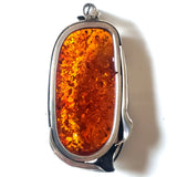back of Large amber pendant in sterling silver