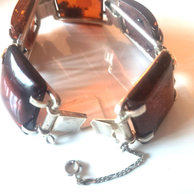 silver lock on large cognac amber bracelet 