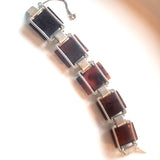 back of large square cognac amber bracelet with sterling silver