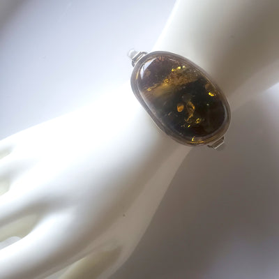 sterling silver with large green amber bracelet