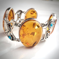 Large oval honey amber link bracelet in sterling silver