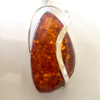 Modern cognac amber large pendant in sterling silver setting 