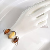 designer silver cuff bracelet with amber