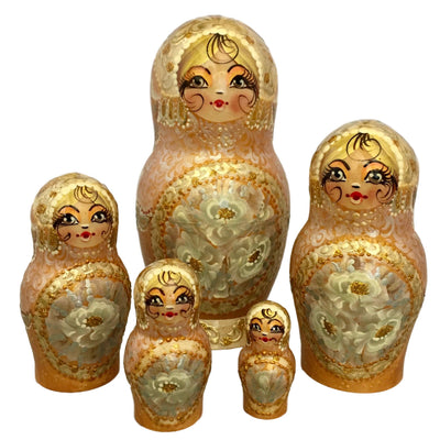 Gold stacking dolls 