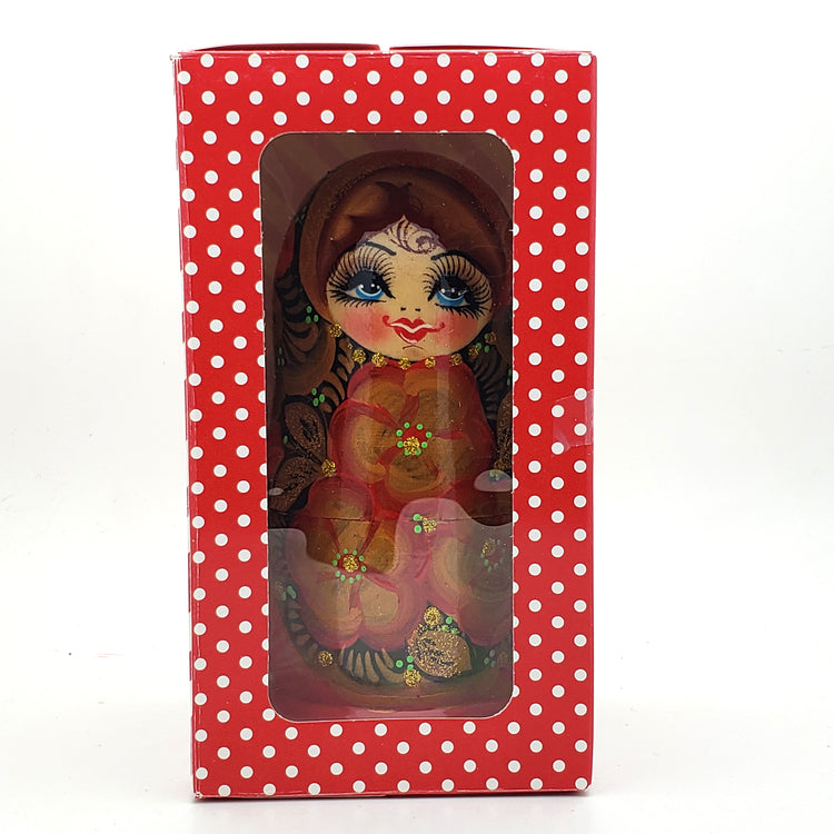 red flowers Russian nesting doll in paper gift box