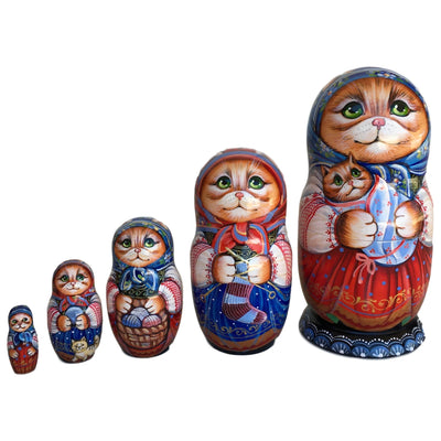 Red kittens Russian nesting box