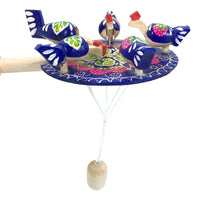 Chicken pecking paddle blue