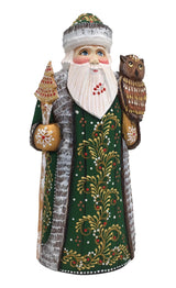 Santa with an owl carved wooden figurine 