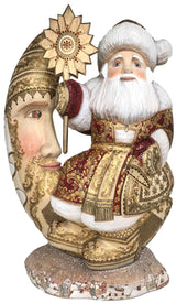 Santa on a moon carved wooden figurine 