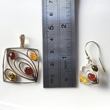 modern amber pendant and earrings set in sterling silver