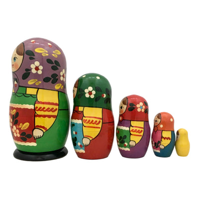 Nesting dolls in traditional Russian dress and scarf 