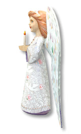 White Christmas angel with candle