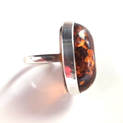 classic amber ring in silver frame