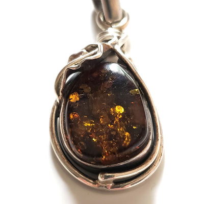 classic amber pendant in silver setting