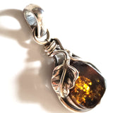natural green amber pendant in silver