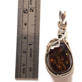 antique amber pendant in silver