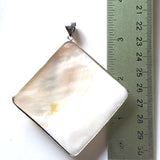 back of mother of pearl pendant