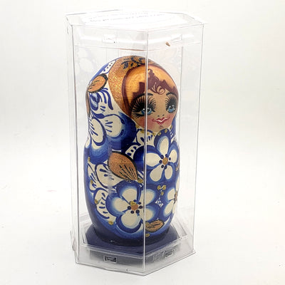 blue with gold nesting doll in gift box