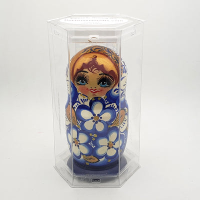 blue with gold nesting doll in gift box