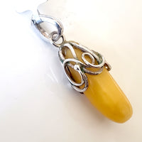 Butterscotch  amber pendant drop in siver