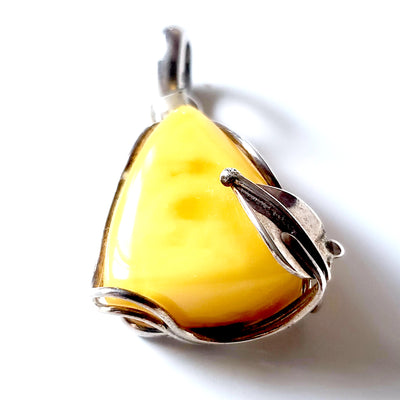 Classic small butterscotch amber pendant in sterling silver frame