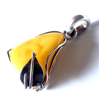 Classic small butterscotch amber pendant in sterling silver frame