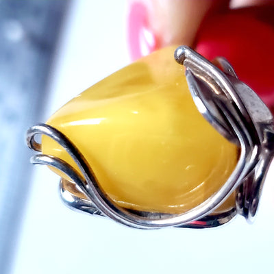 color of Classic small butterscotch amber pendant in sterling silver frame