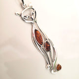 silver cat with natural amber